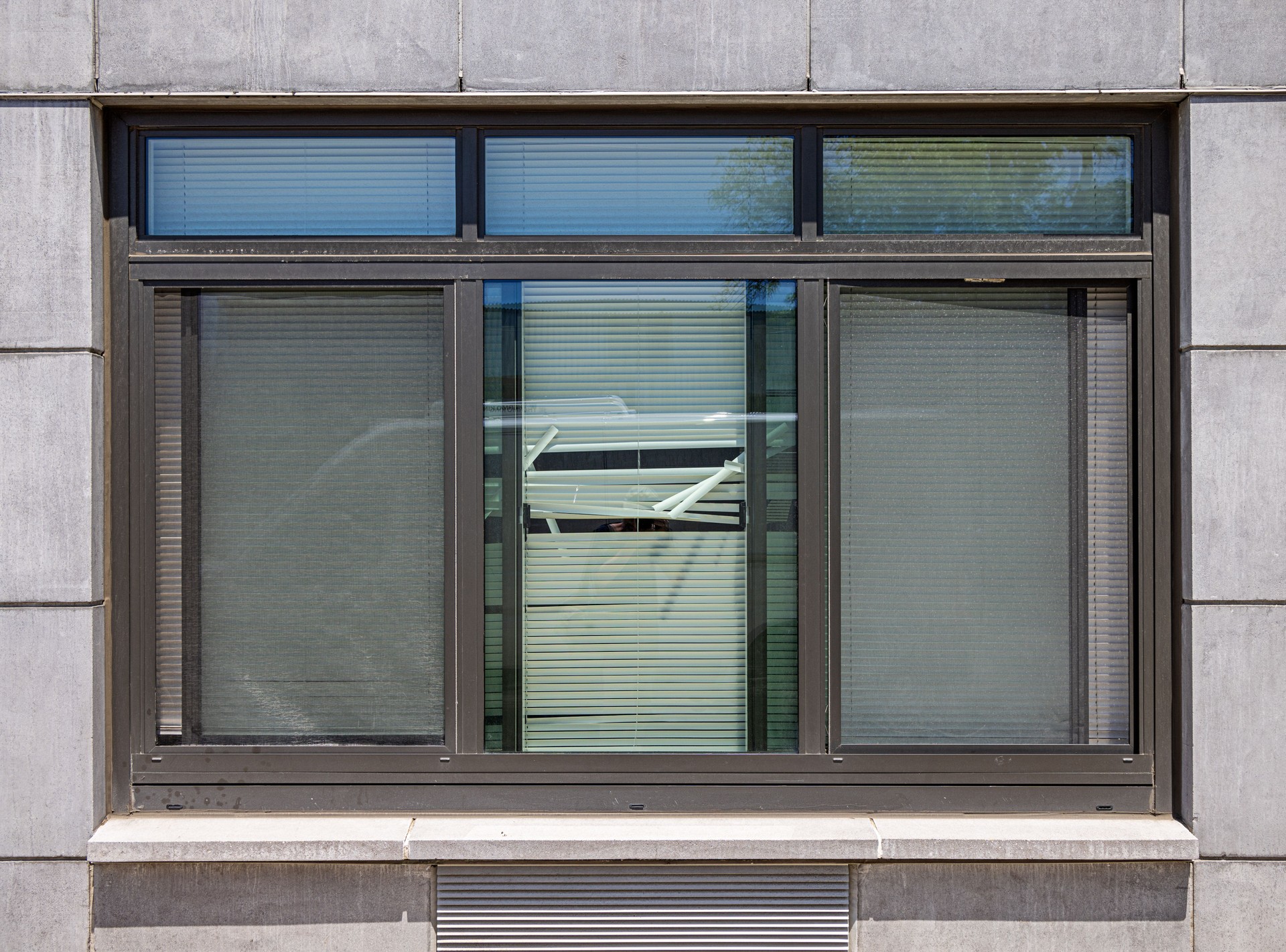 Window with damaged blinds